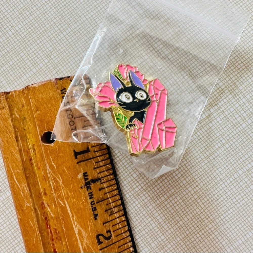 Adorable JiJi in the gemstones from KiKi’s Delivery Service lapel jacket pin